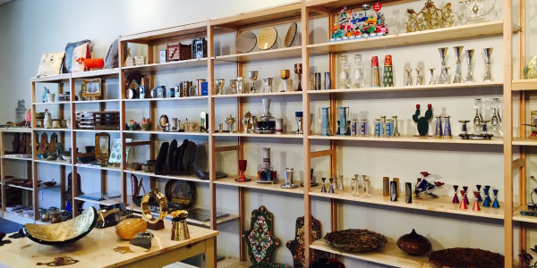 Store shelves filled with Judaica and Israeli art and crafts